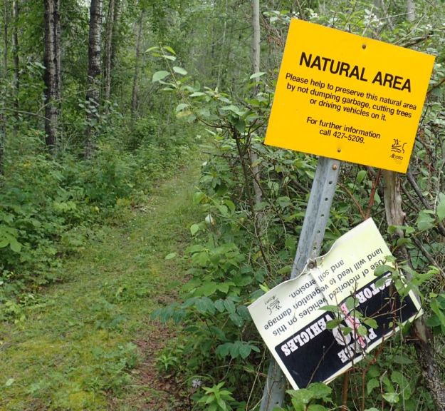 Signs marking the Southeast border of the PA, 2023-07-28 Wabamun NA, P. Potter.
