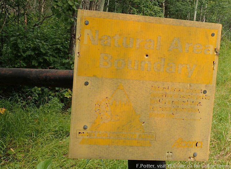 One of the numerous and now faded signs in the NA.