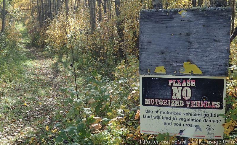 Weather worn signage for North Cooking Lake NA, P.Potter Sept 23, 2023.