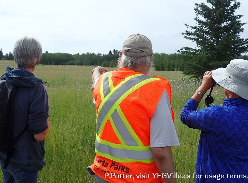 George pointing out a feature of River Lot 56 SAPAA Field Trip. P. Potter.