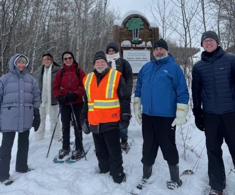 Mary B. (left) and George B. (vest, center) finish showing the UofA students the NA, 2024-12-19-Riverlot56-UofA, Danielle A.