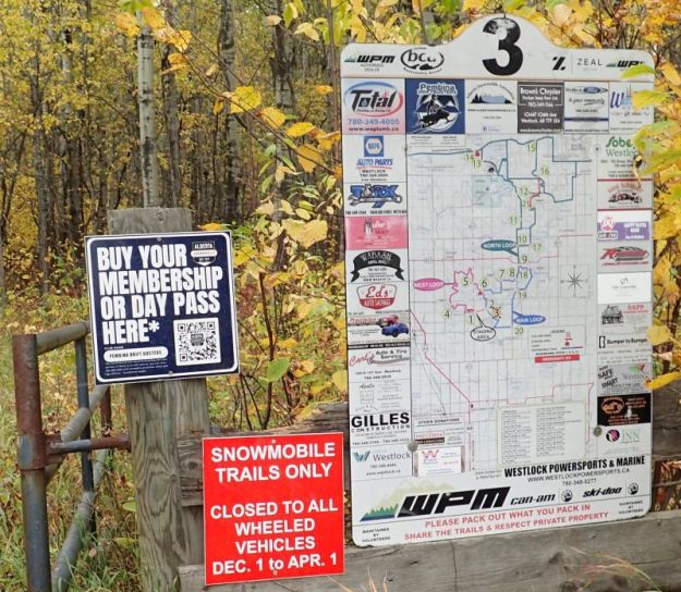 Detail of the entrance signs on the staging area, Spruce Island Lake NA, 2025-09-29, P. Potter.
